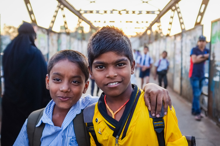 MUMBAI, INDIA - 12 JANUARY 2015: Indian school boys in Dharavi slumのeditorial素材
