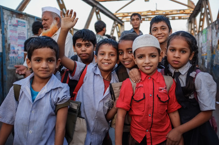 MUMBAI, INDIA - 12 JANUARY 2015: Indian children after school in Dharavi slumのeditorial素材
