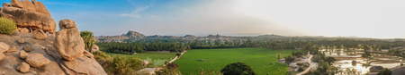 HAMPI, INDIA - 29 JANUARY 2015: Hilltop view of Hampi's boulder strewn landscape and rice paddiesのeditorial素材