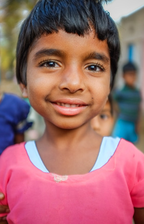 HAMPI, INDIA - 31 JANUARY 2015: Indian girl in pink shirtのeditorial素材