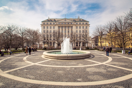 ZAGREB, CROATIA - 17 MARCH 2015: A side view of the main entrance to the Esplanade Hotel in Zagreb from a park with a fountain.のeditorial素材