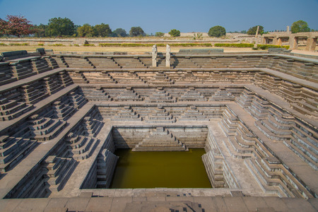 HAMPI, INDIA - 30 JANUARY 2015: Stepped tank in Hampi, a UNESCO World Heritage Site.のeditorial素材