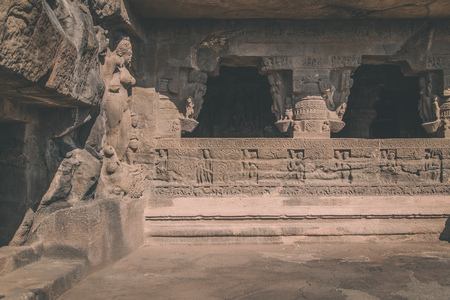 ELLORA, INDIA - 14 JANUARY 2015: Ellora Caves is an archaeological site close to city of Aurangabad. Ellora is a World Heritage Site. Processed with grain, texture and color effect.のeditorial素材