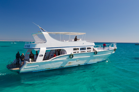 HURGHADA, EGYPT - FEBRUARY 12, 2016: Boat transporting tourists to Paradise Island.のeditorial素材