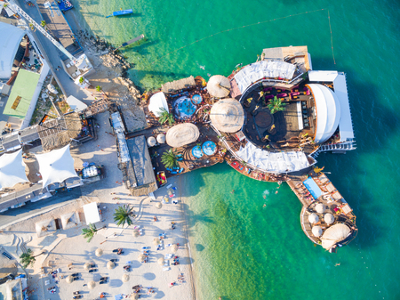 PAG, CROATIA - AUGUST 30, 2014: Aerial view of beach and clubs at popular Zrce beachのeditorial素材