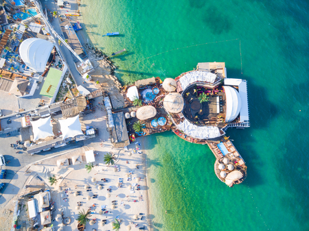 PAG, CROATIA - AUGUST 30, 2014: Aerial view of beach and clubs at popular Zrce beachのeditorial素材