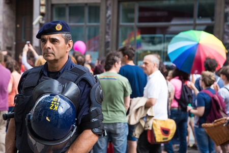 ZAGREB, CROATIA - JUNE 11, 2016: 15th Zagreb pride. Intervention policeman in front of LGBTIQ activists on Ban Josip Jelacic square.のeditorial素材