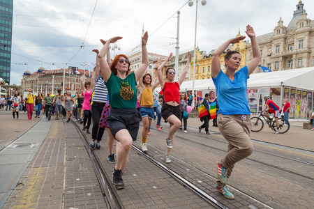 ZAGREB, CROATIA - JUNE 11, 2016: 15th Zagreb pride. LGBTIQ activists dancing at the main square.のeditorial素材
