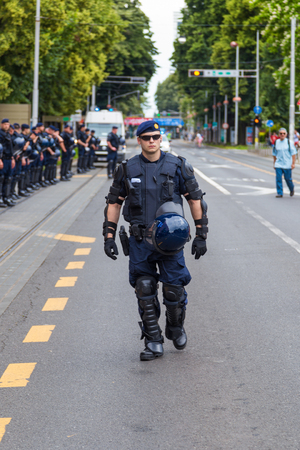 ZAGREB, CROATIA - JUNE 11, 2016: 15th Zagreb pride. Intervention policemen in front of Mimara museum securing LGBTIQ activists and supporters during the gay pride.のeditorial素材