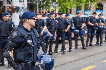 ZAGREB, CROATIA - JUNE 11, 2016: 15th Zagreb pride. Intervention policemen in front of Mimara museum securing LGBTIQ activists and supporters during the gay pride.のeditorial素材