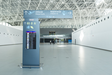ZAGREB AIRPORT - 24 APRIL 2017: Direction signs to check in.のeditorial素材