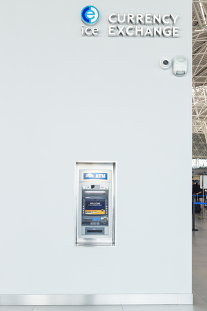ZAGREB AIRPORT - 24 APRIL 2017: ATM machine and currency exchange with CCTV camera.のeditorial素材
