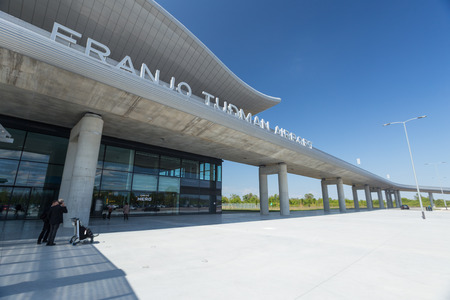 ZAGREB AIRPORT - 24 APRIL 2017: Front entrance with sign Franjo Tudman Airport.のeditorial素材