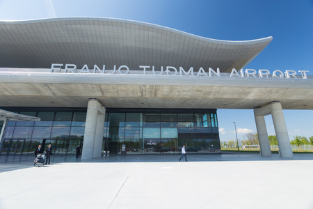 ZAGREB AIRPORT - 24 APRIL 2017: Front entrance with sign Franjo Tudman Airport.のeditorial素材