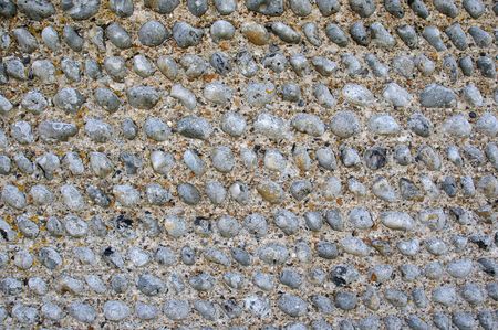 Close up of the texture of a flint wall in sussex