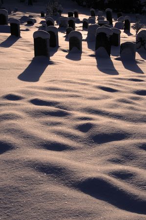 Grave stones in the snowの写真素材