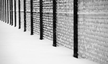 Fence in the snowの写真素材