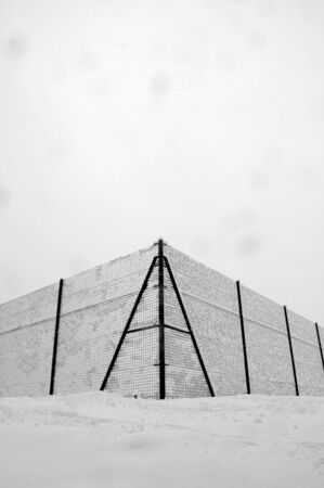 Fence in winterの写真素材