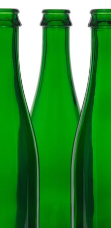A green glass bottle on a white background.の写真素材