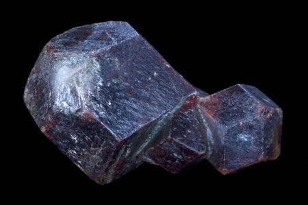 garnet stone mineral in a black isolated background