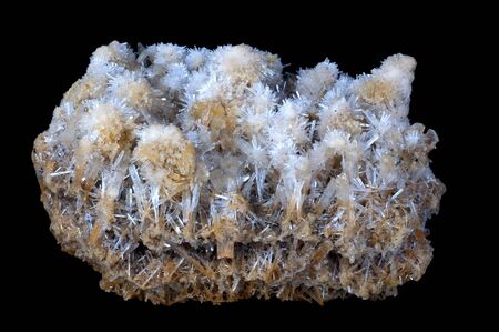 gypsum stone cristalized in a black isolated backgroundの写真素材