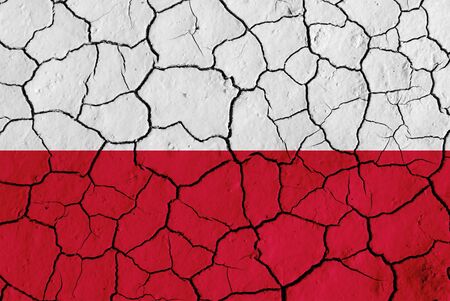 Flag of Poland over cracked background, conceptual image of crisisの写真素材