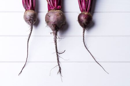 Beets in wood tableの写真素材