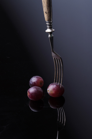 Grapes with dark contrastの写真素材