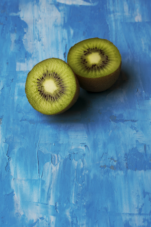 Kiwis in blue background texturedの写真素材