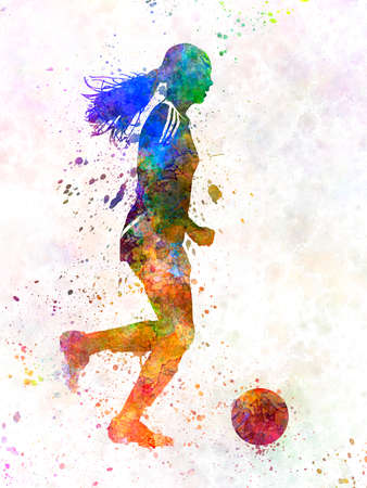 Girl playing soccer football player silhouetteの写真素材