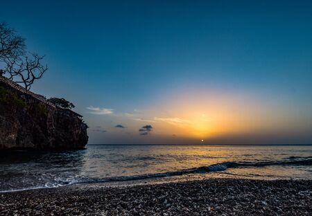 sunset at the beach in the caribbeanの写真素材
