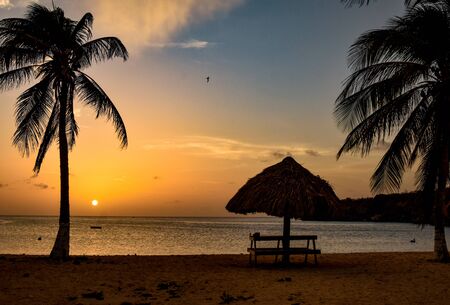 sunset at a beach in the caribbeanの写真素材