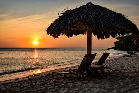 sunset at the beach in the caribbeanの写真素材