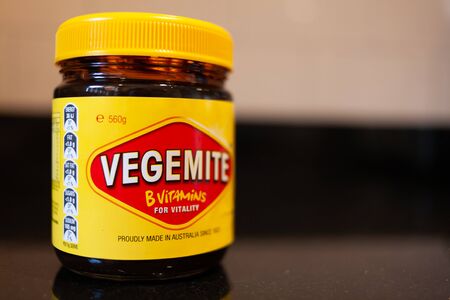 Sydney, Australia - November 2, 2019 - Vegemite Jar Vegemite on kitchen bench with blurred background. An classic icon Australian spread.のeditorial素材