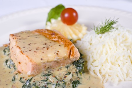 Closeup detail of a salmon steak a la carte mealの写真素材
