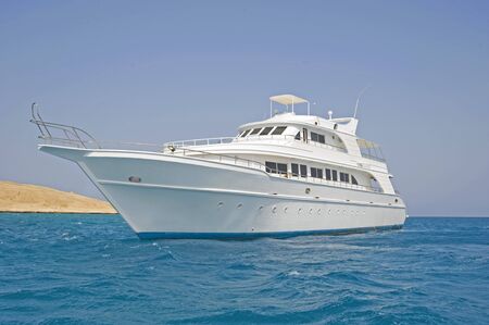 Large luxury motor yacht out at sea