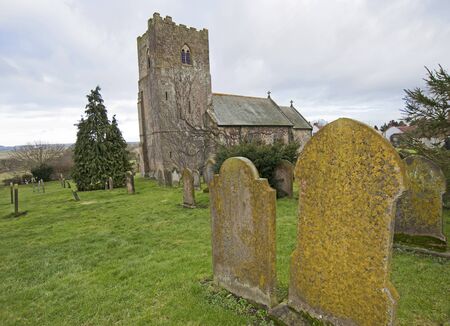Church and graveyard in an english countryside communityの写真素材