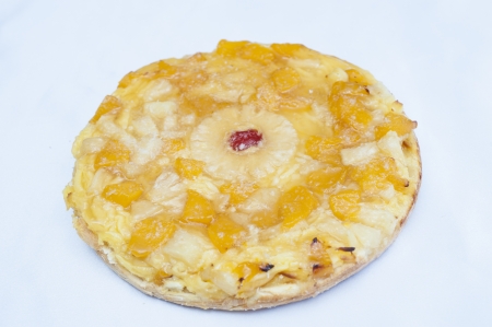 Large fruit tart isolated on a white backgroundの写真素材