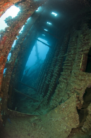Interior of an old shipwreck underwater showing structureの写真素材