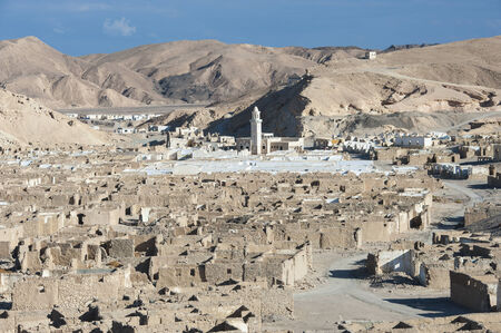Panorama over an abandoned ghost town in desert mountainsの写真素材