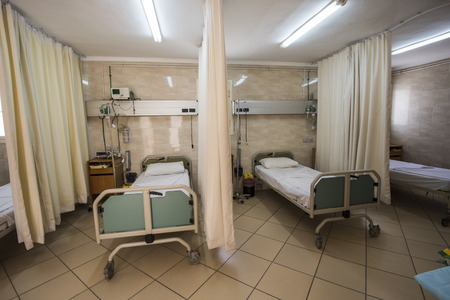 Beds in a hospital ICU ward roomの写真素材