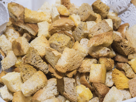 Selection display of bread croutons food at a luxury restaurant buffet bar areaの写真素材
