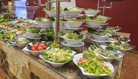 Selection display of salad food at a luxury restaurant buffet bar areaの写真素材