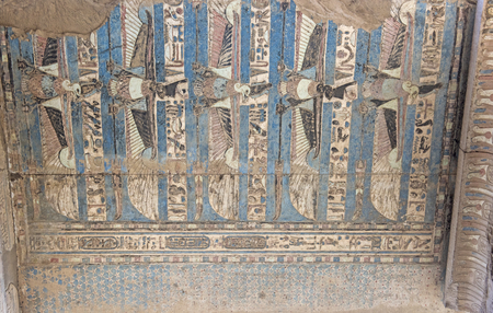 Painted hieroglypic carvings on wall at the ancient egyptian temple of Kom Omboの写真素材