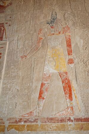 Hieroglypic carvings and paintings on interior wall at the ancient egyptian temple of hatshepsut in...