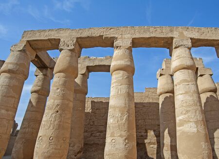 Hieroglypic carvings on columns at the ancient egyptian Luxor temple