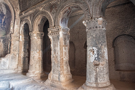 Interior architecture detail of ancient Byzantine Christian civilisation church ruins with rock-cut columns at Ihlara Valley Cappadocia Turkeyの写真素材