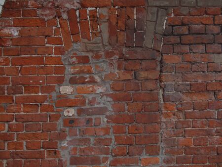 old red window brick wall texture grunge background with vignetted corners, may use to interior designの写真素材