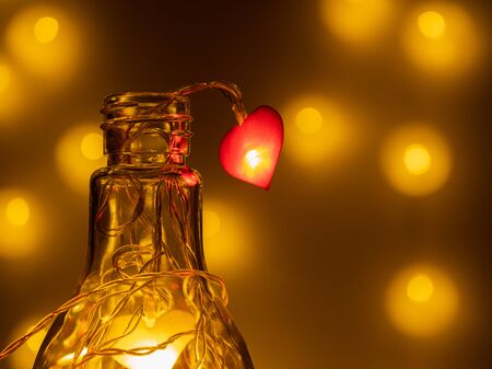 Decorative light bulb with lights in the form of hearts.の写真素材