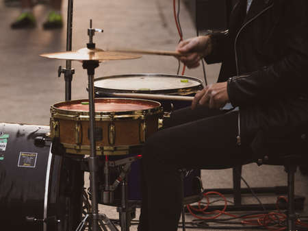 musician drummer on the streets of the cityの写真素材